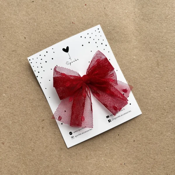 Tiulio bantukas segtukas raudonas į plaukus