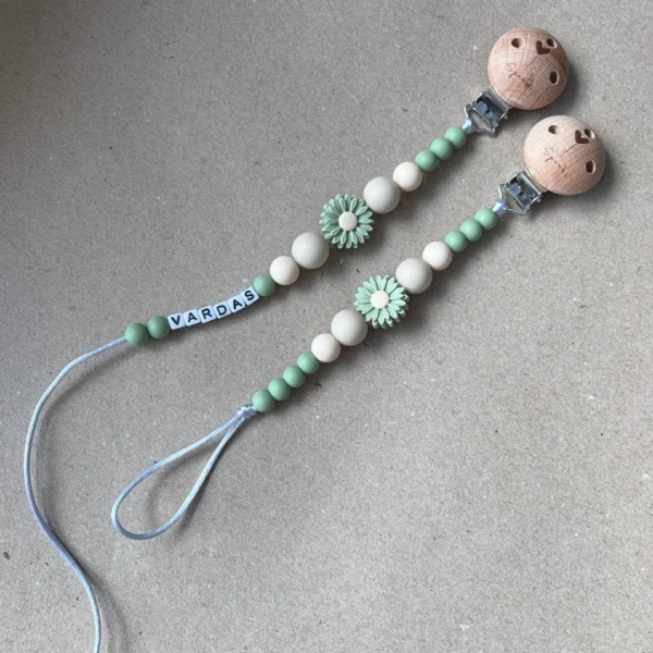 Vardinis čiulptuko laikiklis