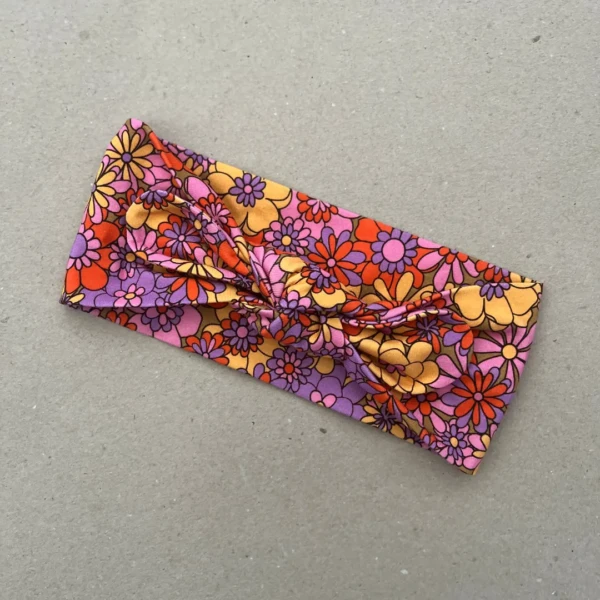 Plati galvos juosta mergaitei su boho stiliaus spalvingomis gėlėmis