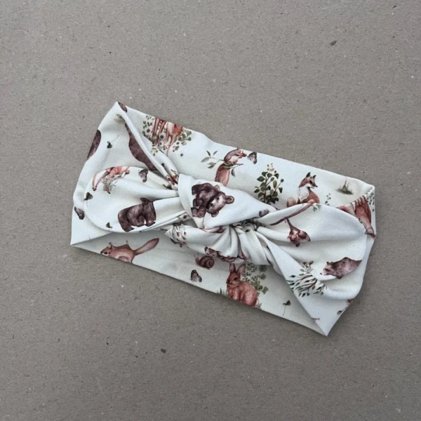 Plati galvos juosta mergaitei su miško gyvūnėlių raštu