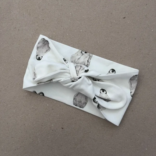 Plati galvos juosta mergaitei balta su pingvinų raštu