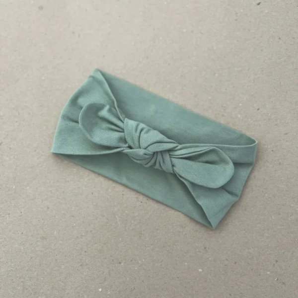 Plati alyvuogių žalios spalvos galvos juosta mergaitei su bantuku
